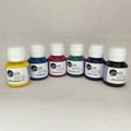 Six small bottles of Arasilk silk paint.  Colours are primary yellow cyan, magenta, malachite, violet, black