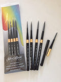 Set of artist travel brushes with packaging on a white background