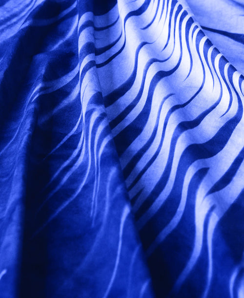 Blue fabric with wavy pattern