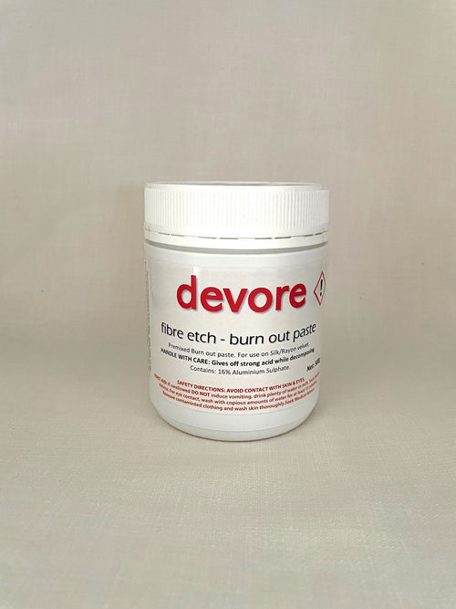 Devore fibre etch burn out paste container on a beige background