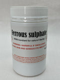 Container labeled 'Ferrous Sulphate' with warning text on a white background