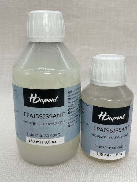 Two bottles of H Dupont Epaississant Thickener on a light gray background