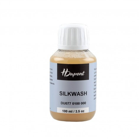 Bottle of H Dupont Silkwash on a white background