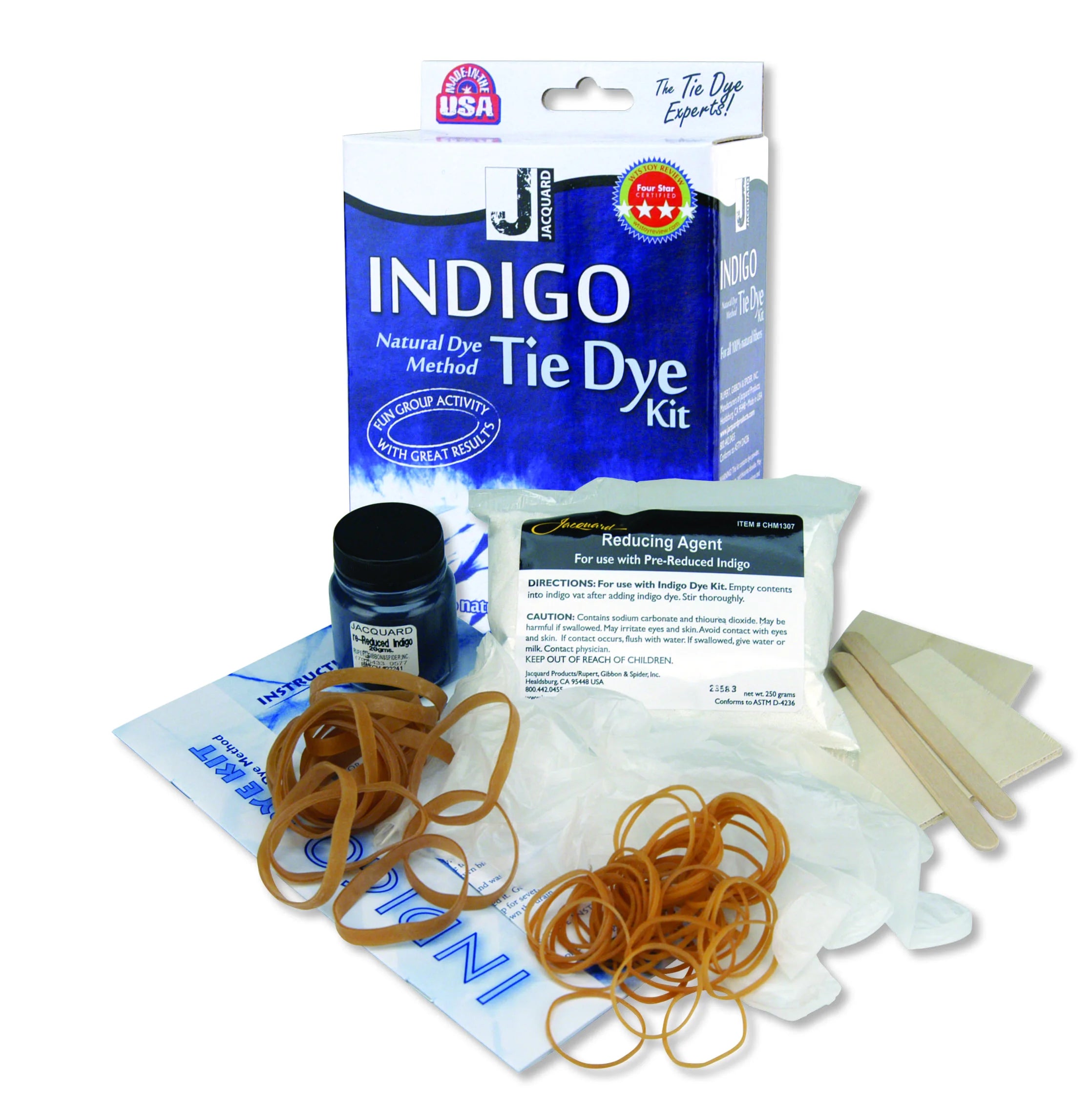 Indigo tie dye kit with rubber bands and other supplies on a white background
