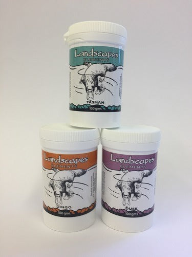 Three containers of Landscapes Essentials with different flavors on a white background