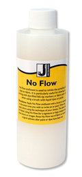 Bottle of Jacquard No Flow liquid with yellow label on a white background