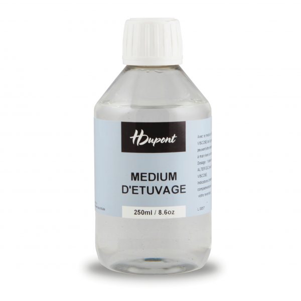 Bottle of Dupont steaming medium with a white cap on a white background