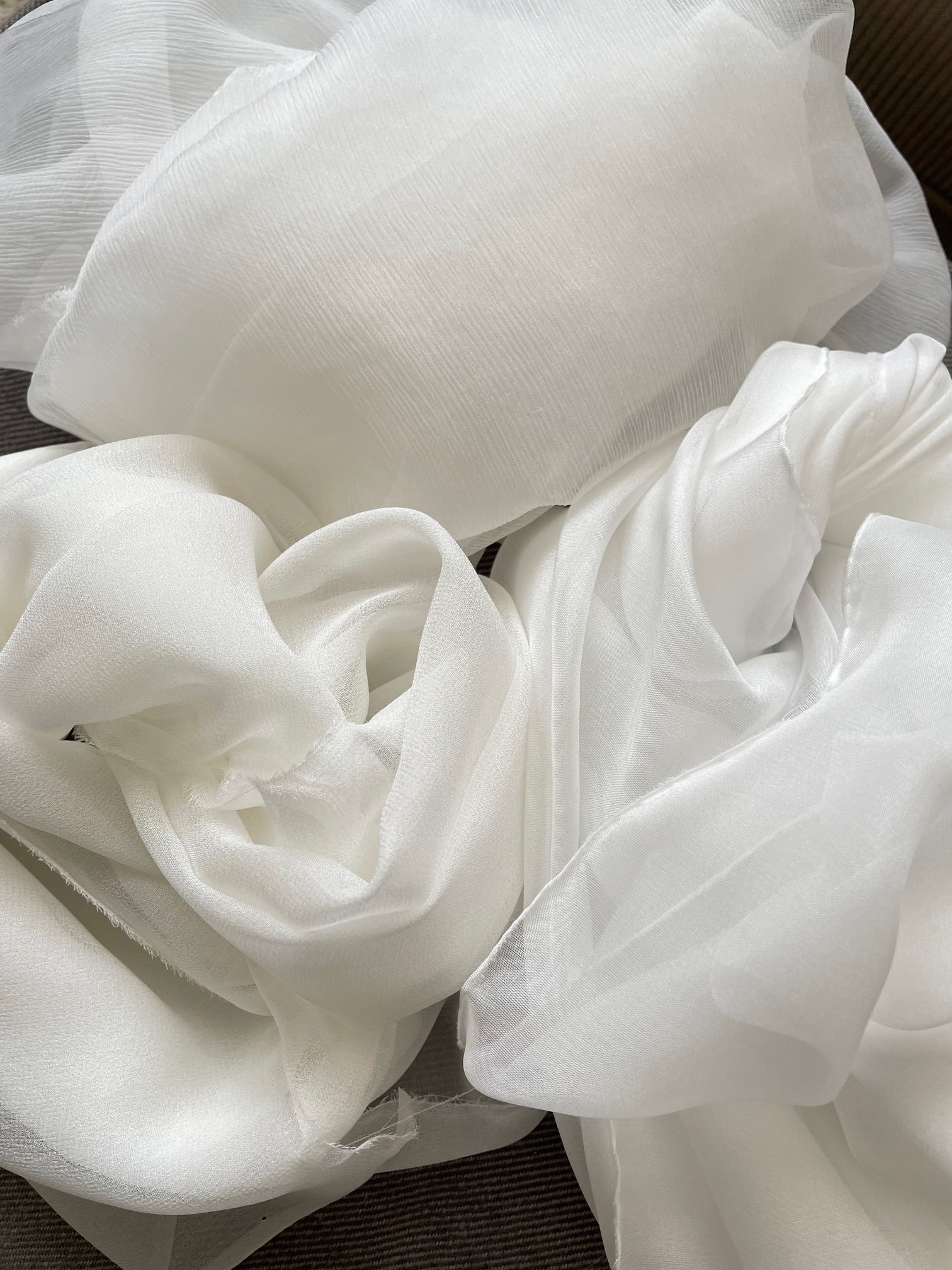 Undyed Sheer silk  fabric draped over a surface