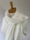 Undyed Viscose Velvet Scarf draped over a wooden mannequin against a plain background
