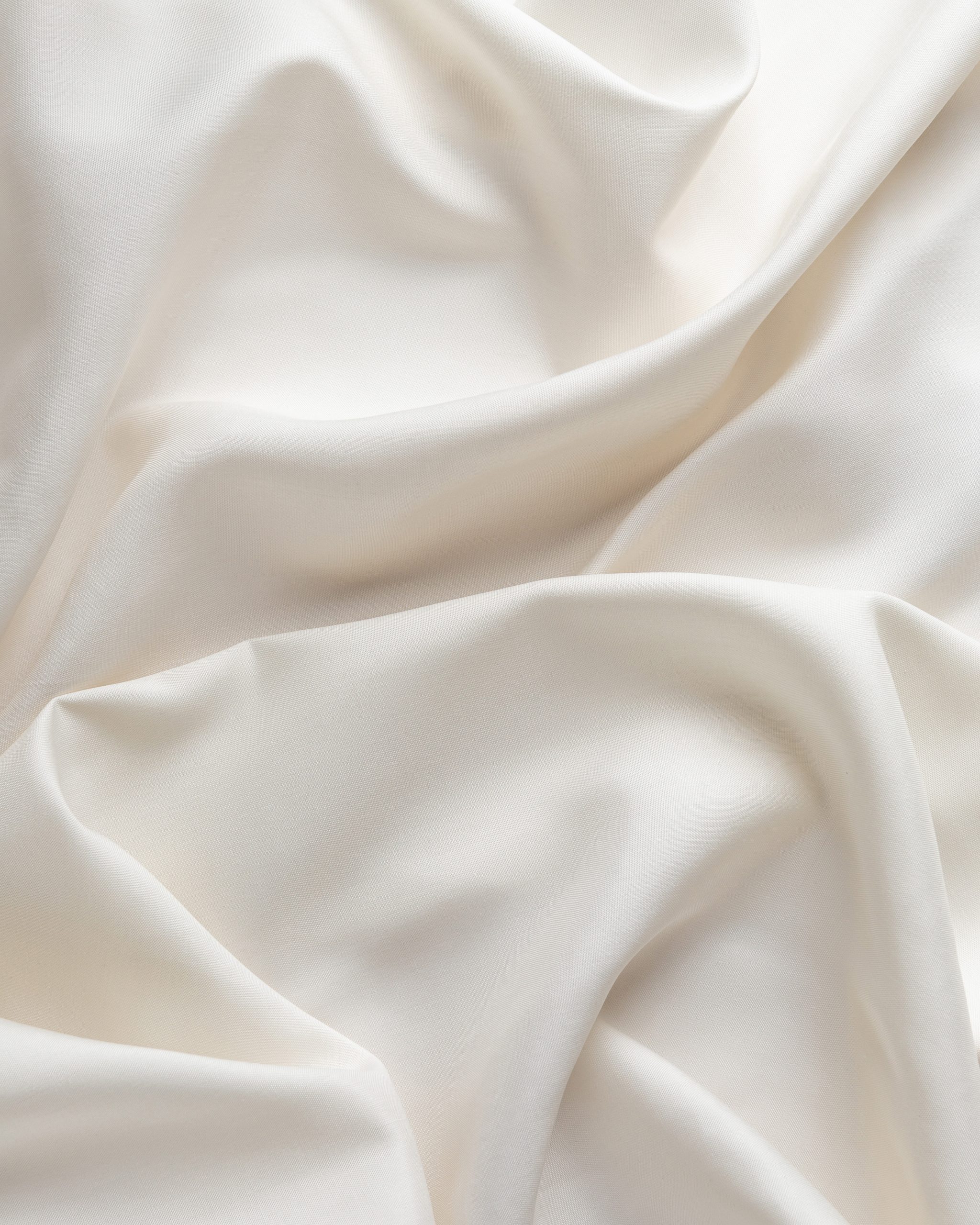 Close-up of undyed fuji silk fabric with folds