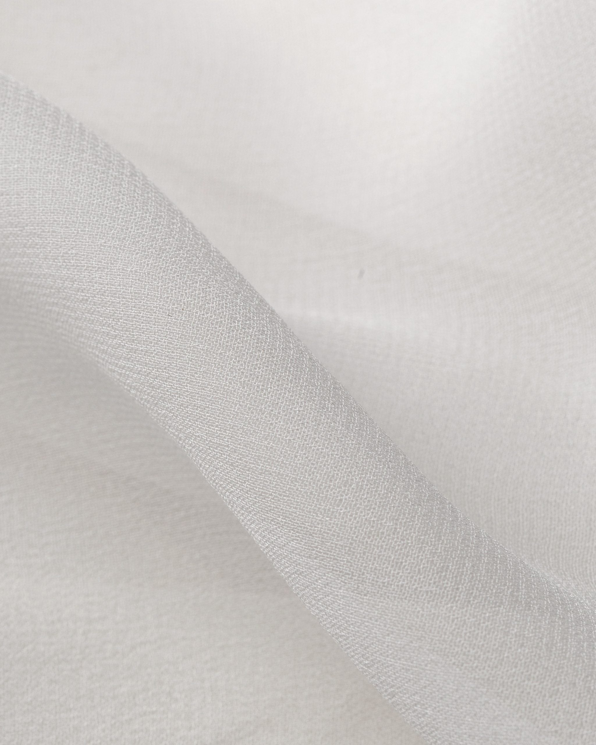 Close-up of textured undyed silk georgette fabric