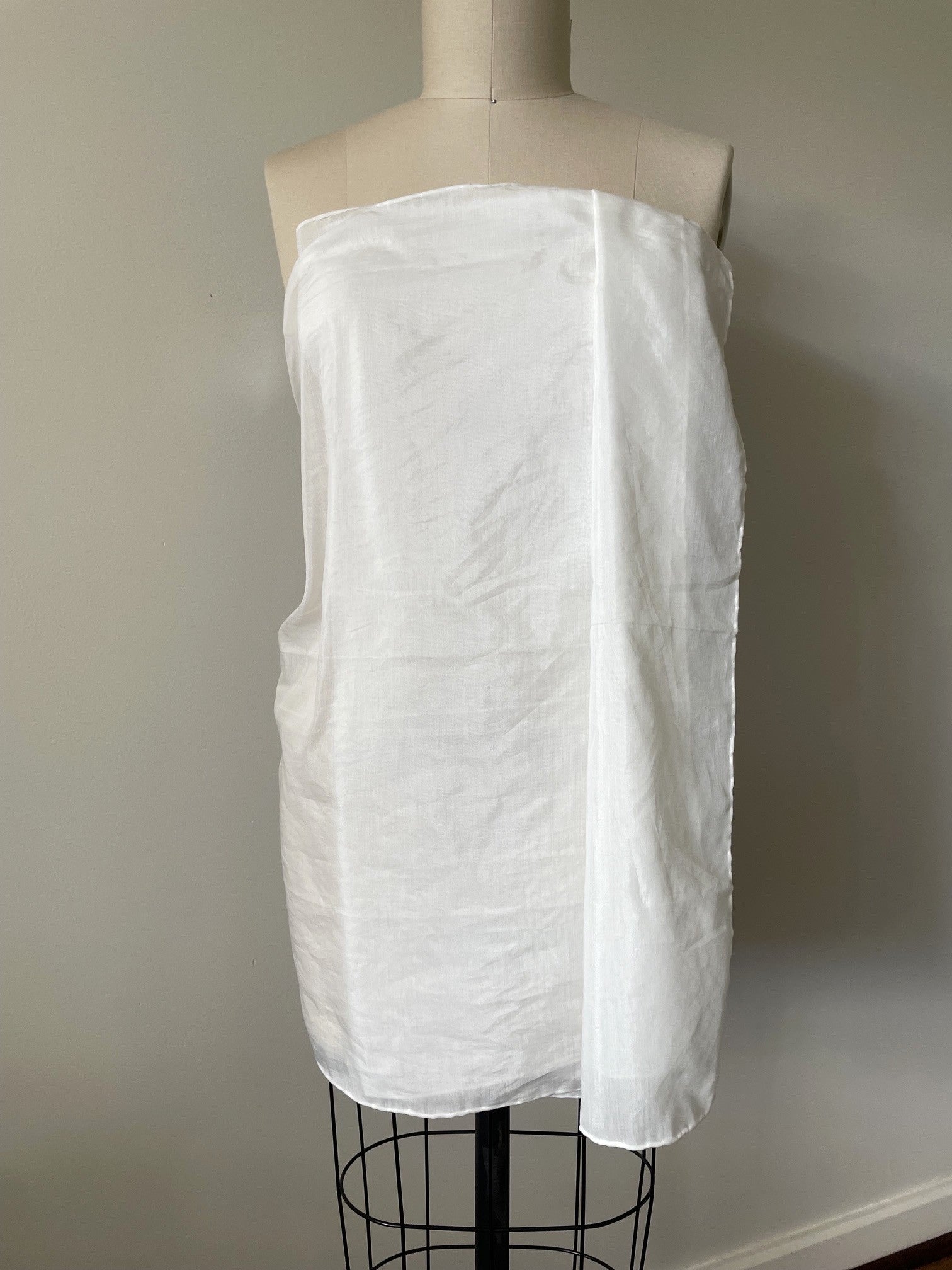Undyed silk cotton voile sarong on a mannequin against a plain background