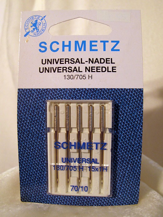 Schmetz universal needle packet on a white background